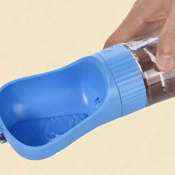 Portable pet water bottle with blue drinking tray for dogs and cats