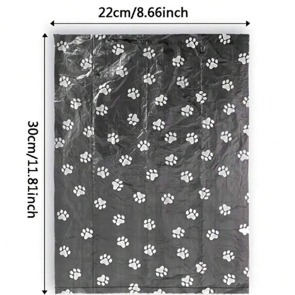 Black pet waste bag with white paw prints, 22x30cm, shown flat on white background
