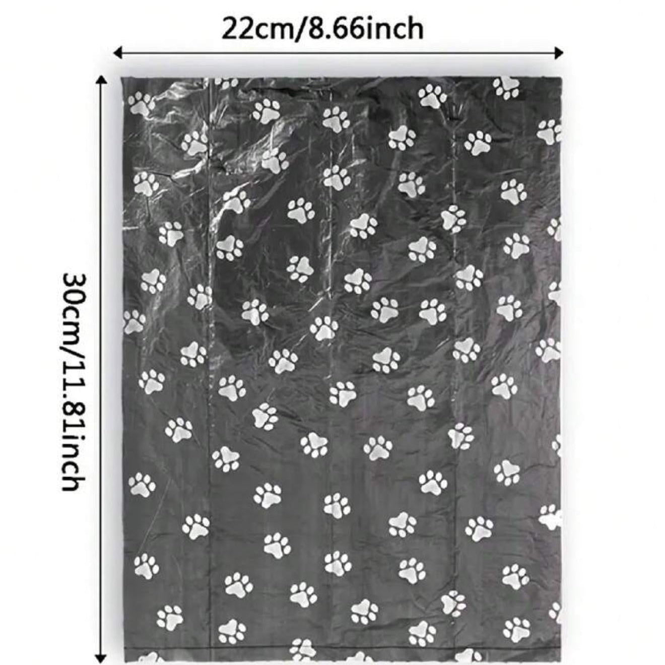 Black pet waste bag with white paw prints, 22x30cm, shown flat on white background