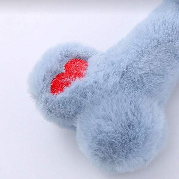 Plush blue dog toy bone with red heart embroidery on a white background