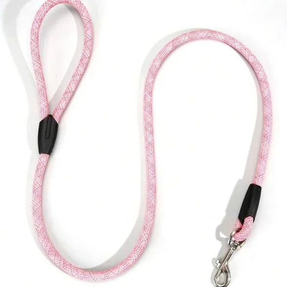 Pink rope pet leash with metal clip, stylish dog walking accessory on white background